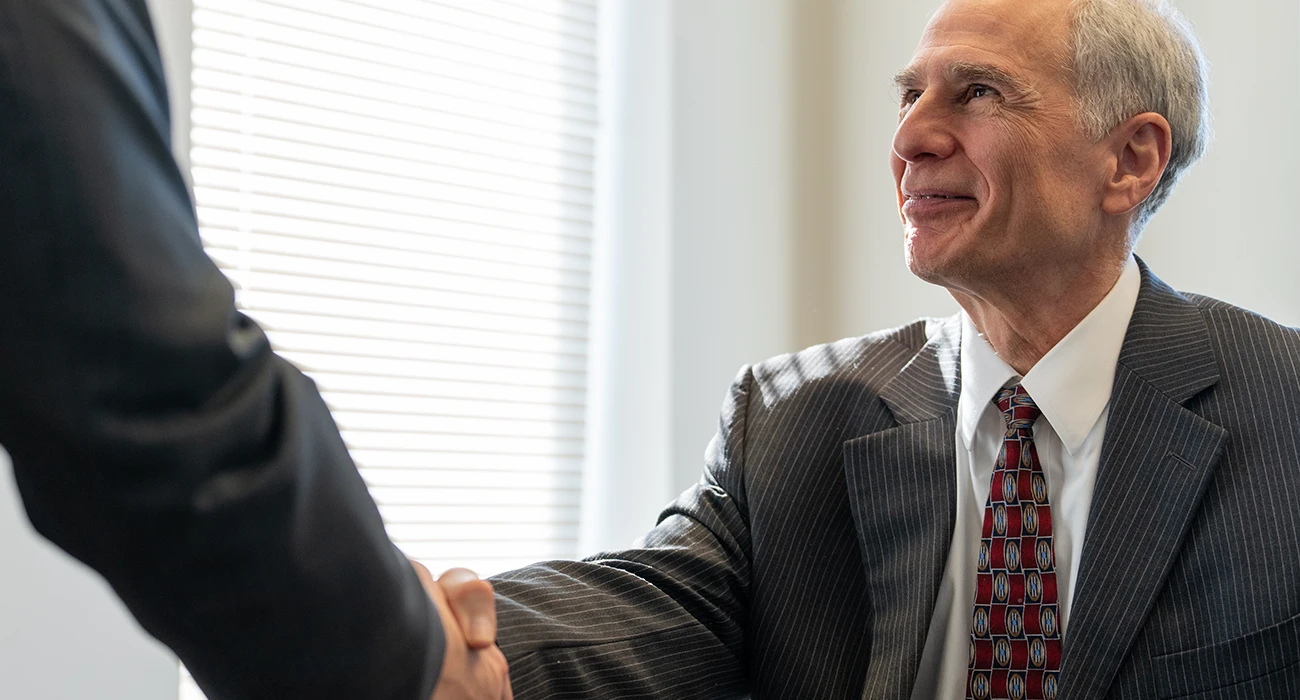 Attorney shaking hands